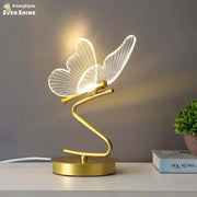 Gold butterfly led table lamp with translucent wings and sleek curved base for bedroom decorbites butterfly led table lamp