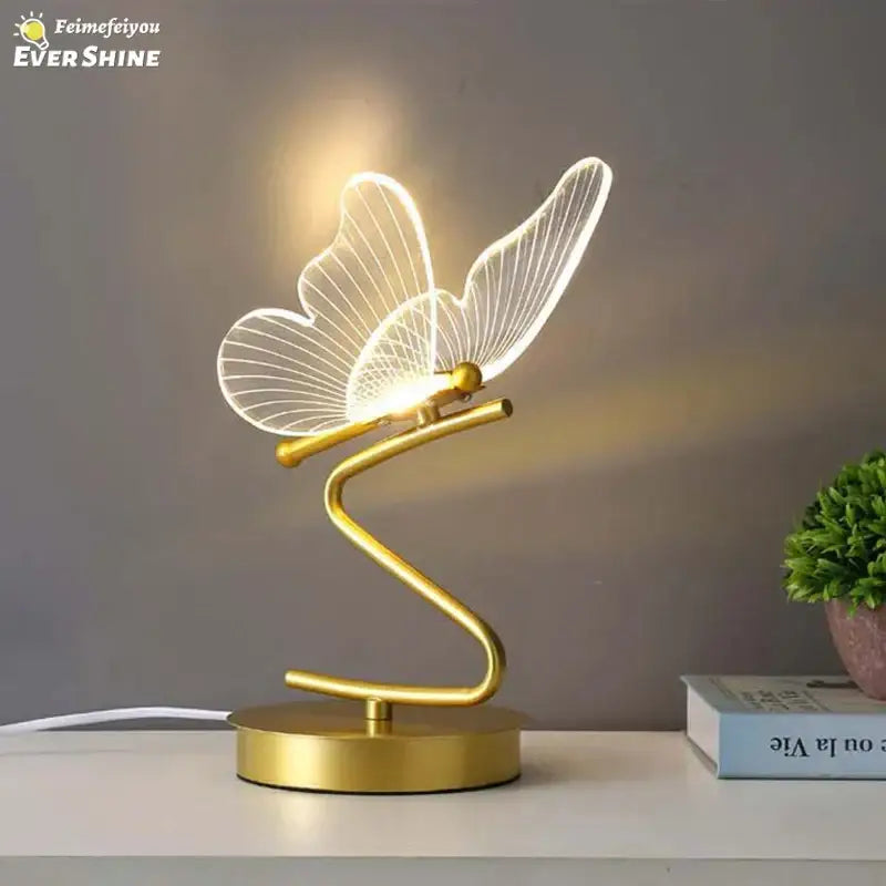 Gold butterfly led table lamp with translucent wings and sleek curved base for bedroom decorbites butterfly led table lamp