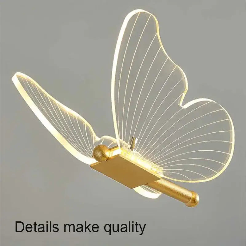 Gold-toned butterfly led table lamp with translucent wings and internal lighting for bedroom decor by decorbites butterfly led