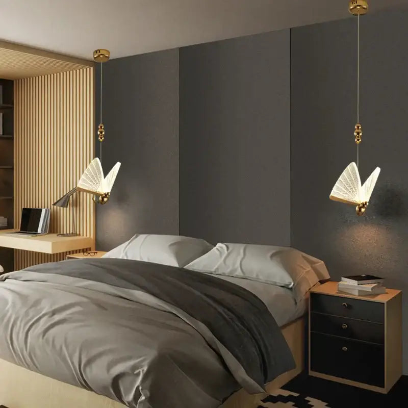 Gold butterfly pendant light with acrylic elements and gold-finished illuminated wings works beautifully in bedroom