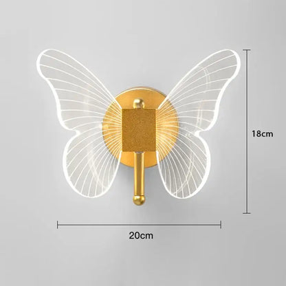 Gold-toned butterfly wall lamp with translucent illuminated wings and central square peg for decorbites butterfly wall use