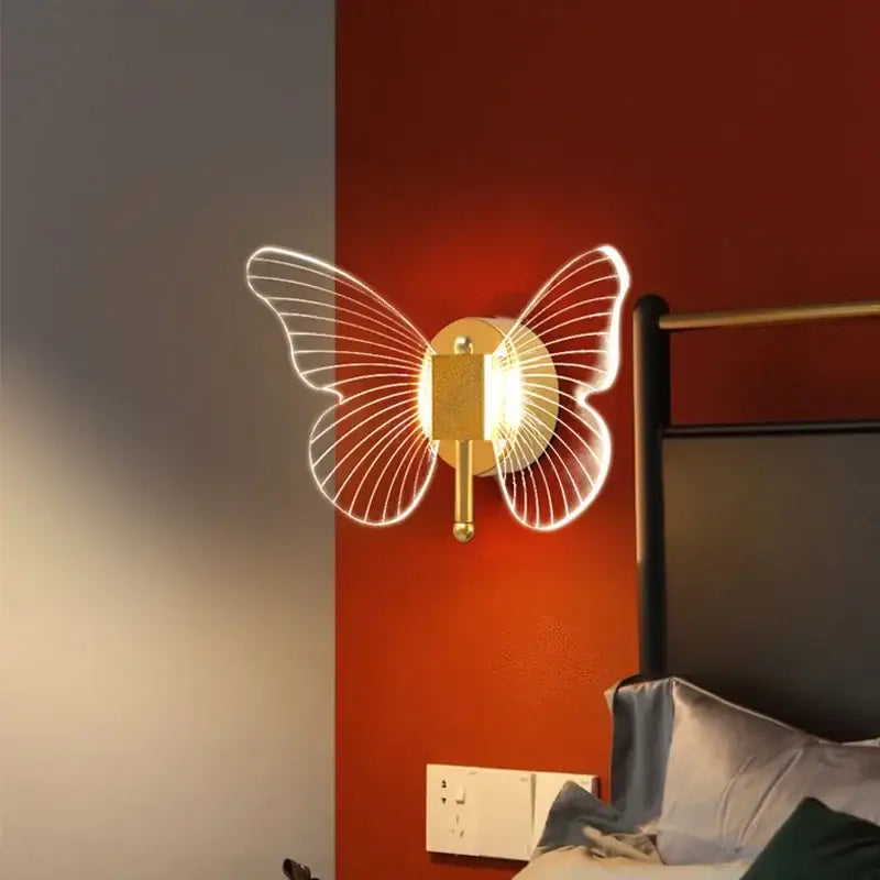 Gold butterfly wall lamp with gold-toned metal and illuminated translucent wings for elegant bedroom decorbites butterfly wall lamp