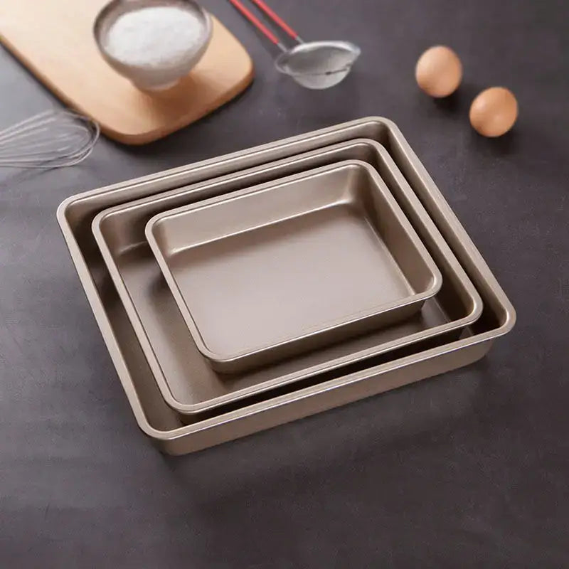 Set of three nested gold carbon steel cake baking trays with matte finish decorbites carbon steel non stick pans
