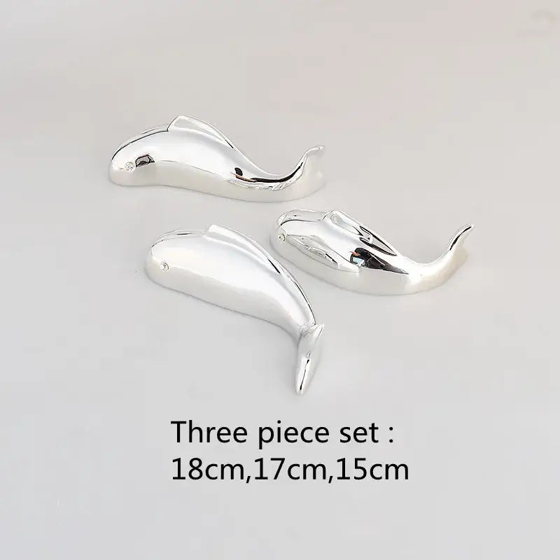 Set of three polished silver dolphin-shaped decorative ornaments in varying sizes for decorbites carp fish lotus wall art