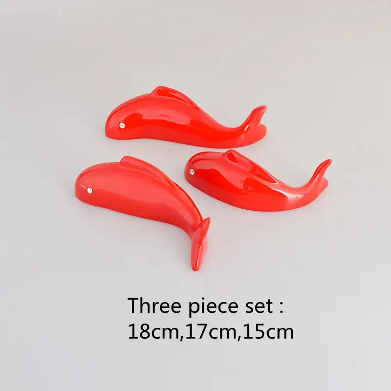 Set of three glossy red ceramic dolphin figurines with silver dots complement decorbites carp fish lotus wall art decor
