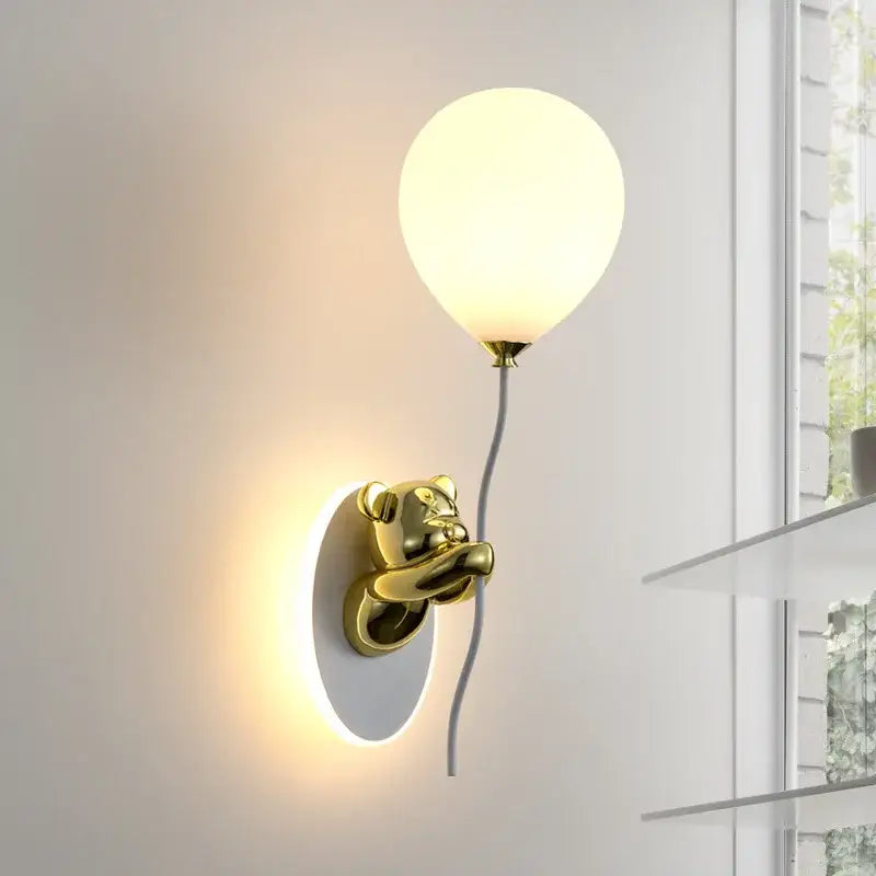 Gold cartoon bear balloon wall lamp featuring a gold bear holding a frosted glass balloon lampshade for children’s bedroom decorbites cartoon bear