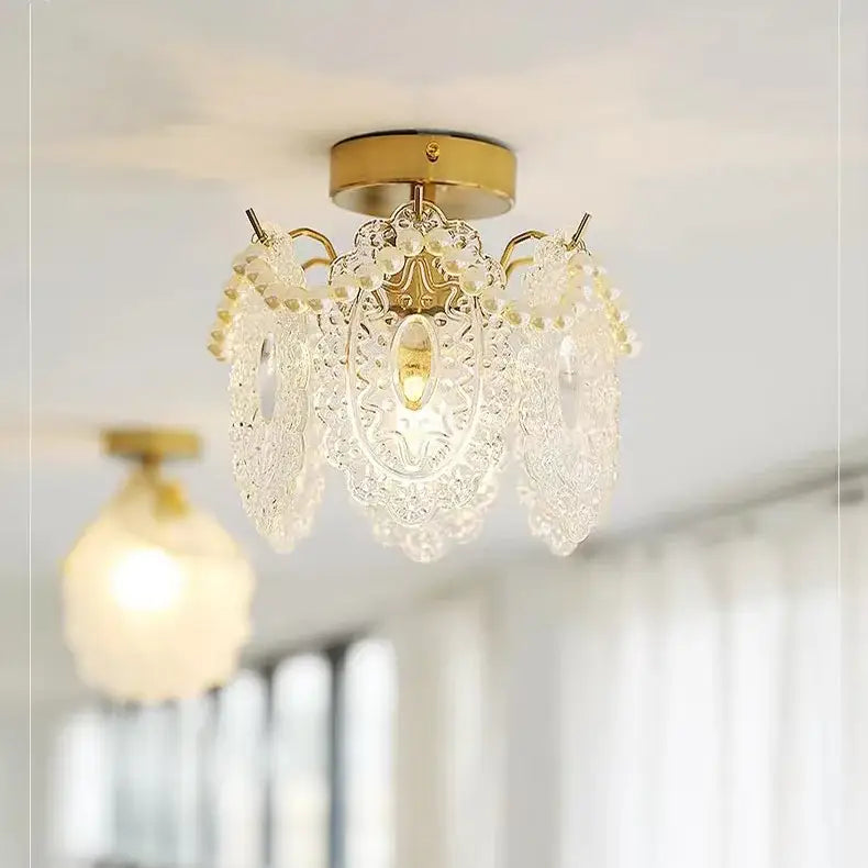 Gold carved glass pearl chandelier with delicate clear crystal and intricate lace-like cutouts for dining room decorbites carved glass