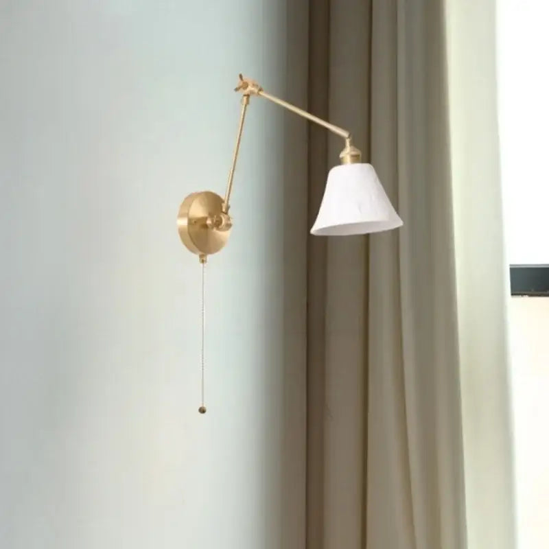 Gold ceramic led wall lamp with brass adjustable arm and white ceramic led wall conical shade for living room decorbites ceramic led