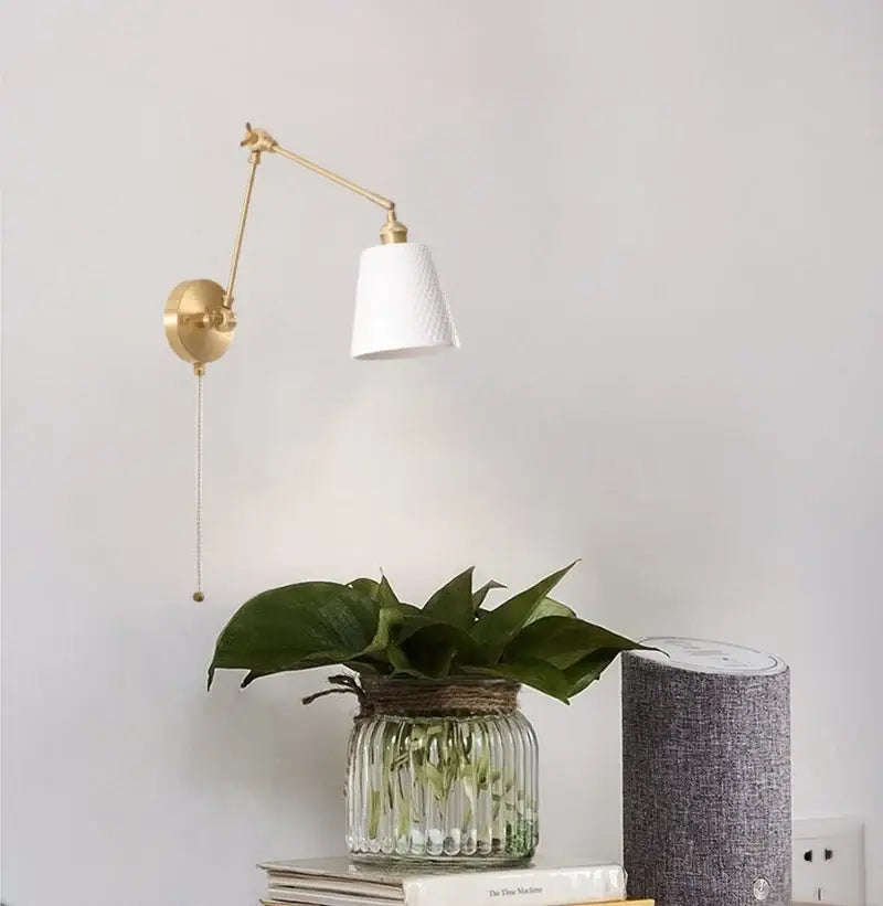 Gold ceramic led wall lamp with adjustable gold-finished wall sconce and white ribbed fabric shade for living room decorbites ceramic led