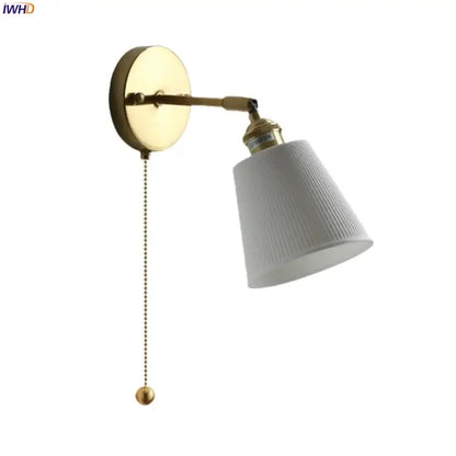 Gold ceramic led wall sconce with gold finish, ribbed white shade, and pull-chain switch for bedroom decorbites ceramic led wall
