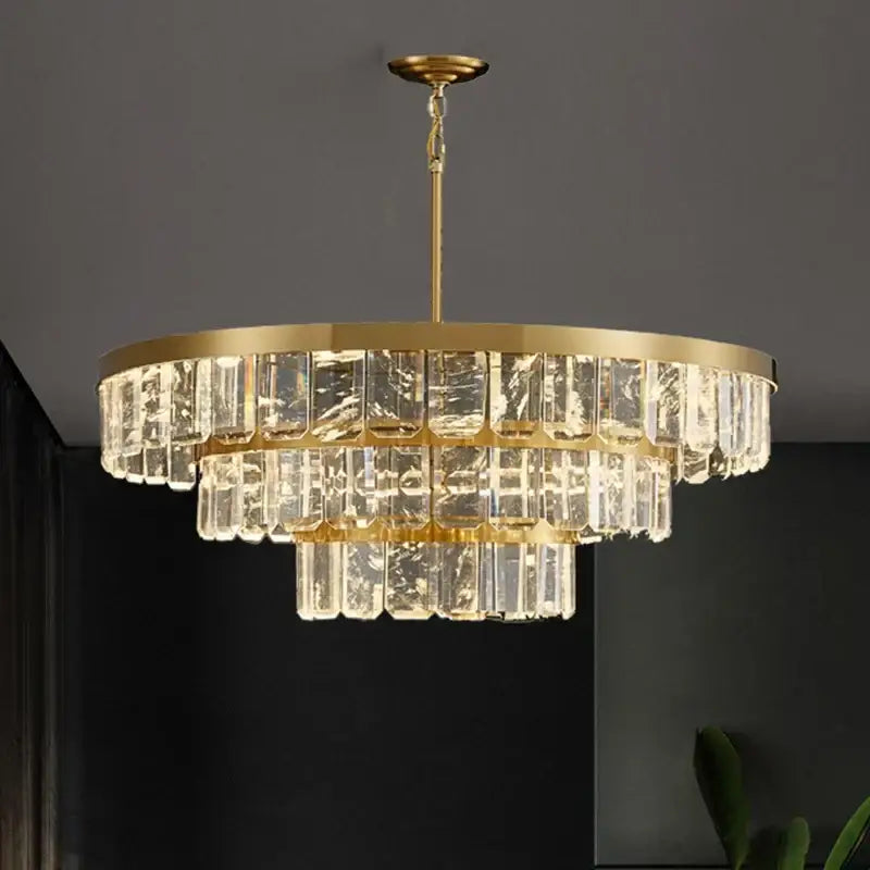 Gold cloud mist crystal chandelier with three tiers of clear crystal prisms on polished brass frame for dining room decorbites cloud mist