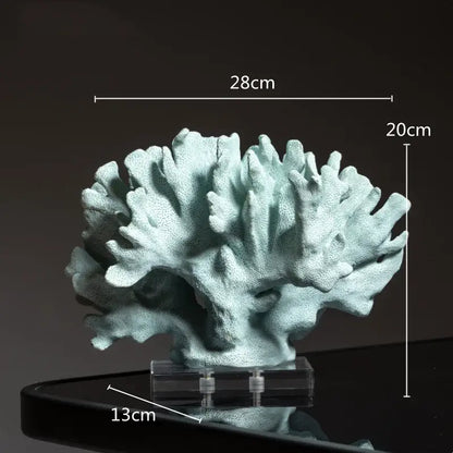 A light teal coral crystal tree sculpture with intricate branching details and matte finish for living room decor