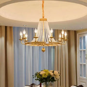 Gold-toned country candle crystal chandelier with cascading beads and lit bulbs for dining room decorbites pendant light