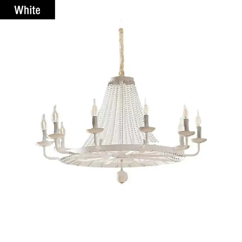 White country candle crystal chandelier with gold accents and candle-style bulbs for dining room decorbites decor