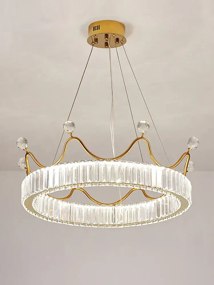 Gold-toned crown crystal chandelier with clear crystal accents and modern design for elegant bedroom decorbites crystal chandelier