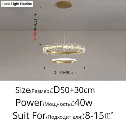 Gold-toned DecorBites Nordic style crystal flower pendant light with double rings and clear crystal droplets in a modern design