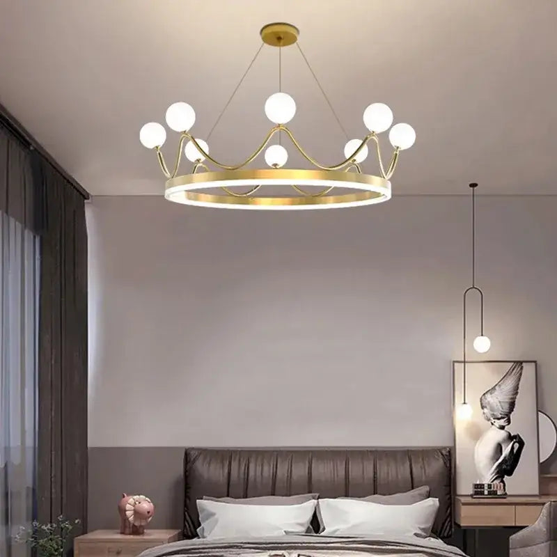 Gold-toned decorbites crown led chandelier with spherical white bulbs ideal for kids room lighting and decor