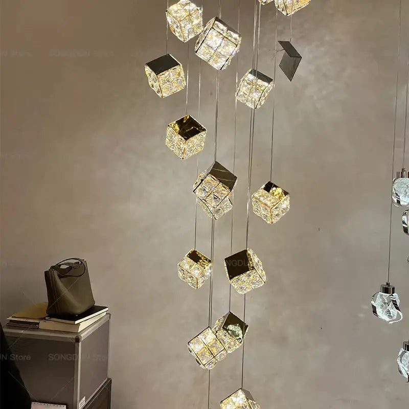 Gold crystal bedside chandelier wall light featuring hanging crystal cubes with gold and mirrored finishes for bedroom decorbites crystal bedside