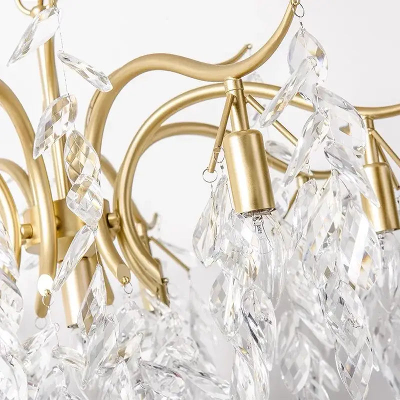 Delicate gold-toned decorbites crystal branch chandelier with cascading clear crystal leaves for luxury living room lighting