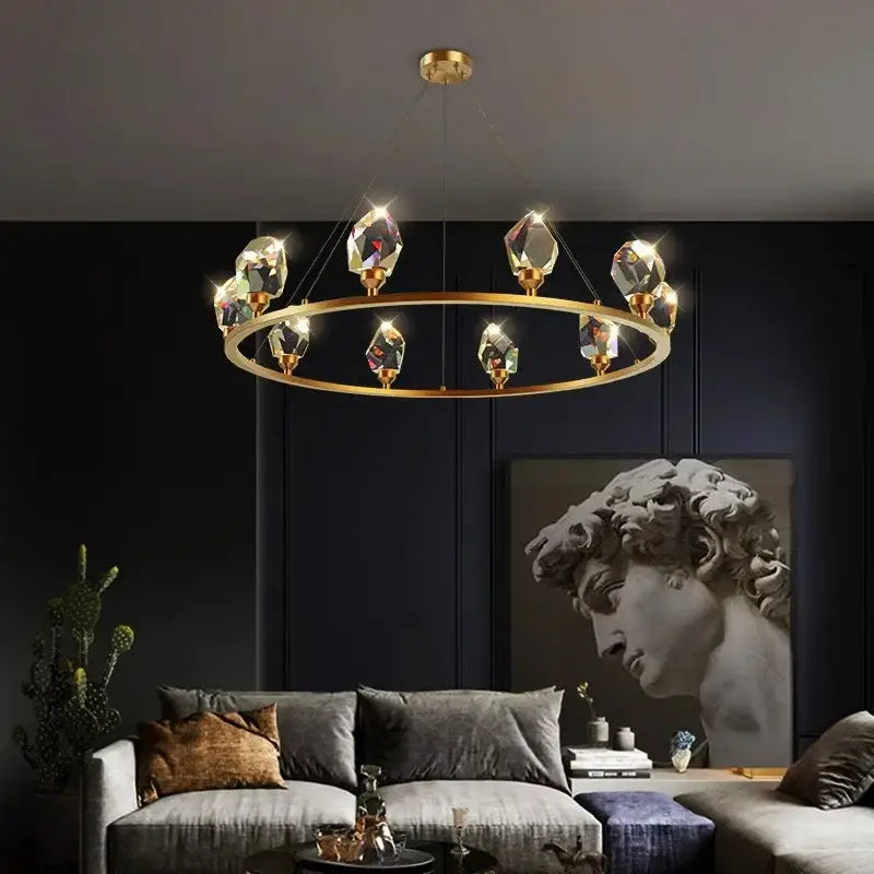 Gold-toned circular dining room chandelier with faceted crystal pendants for decorbites dining room lighting