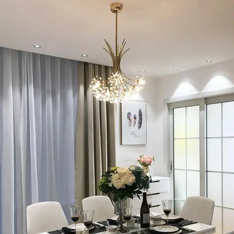Gold-toned crystal flower pendant chandelier with branching arms and sparkling lights for dining room decorbites crystal flower