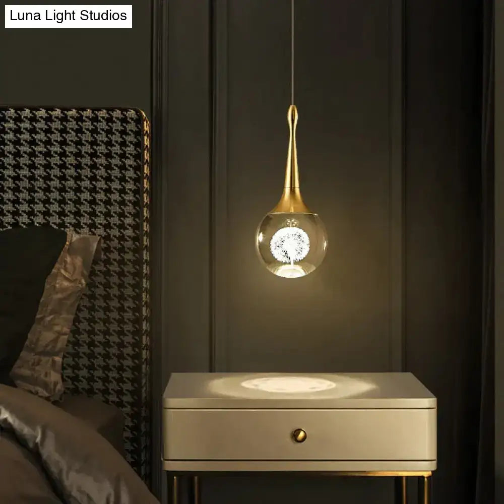 Gold-toned DecorBites Clara pendant lights with teardrop crystal glass globe and illuminated led crystal glass dandelion design