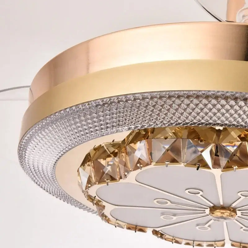 A modern gold ceiling fan with crystal invisible fan accents and a white petal-shaped light diffuser for living room decorbites crystal invisible