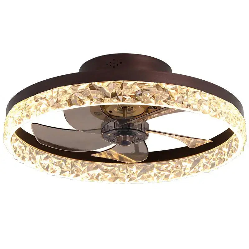 A modern gold crystal led ceiling fan with dark bronze finish and warm glowing faceted crystal led rings decorbites ceiling fan
