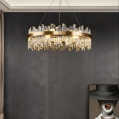 A gold crystal led oval chandelier with a metal frame and clear crystal prisms for dining room decorbites crystal led