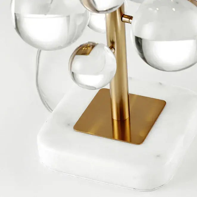 Gold crystal marble bubble table lamp with modern glass sphere, polished brass stem, and white marble base for decorbites decor