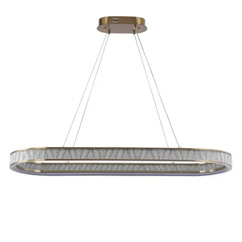 Gold crystal oval pendant chandelier with textured glass ring and gold-toned metal frame for dining room decorbites crystal oval