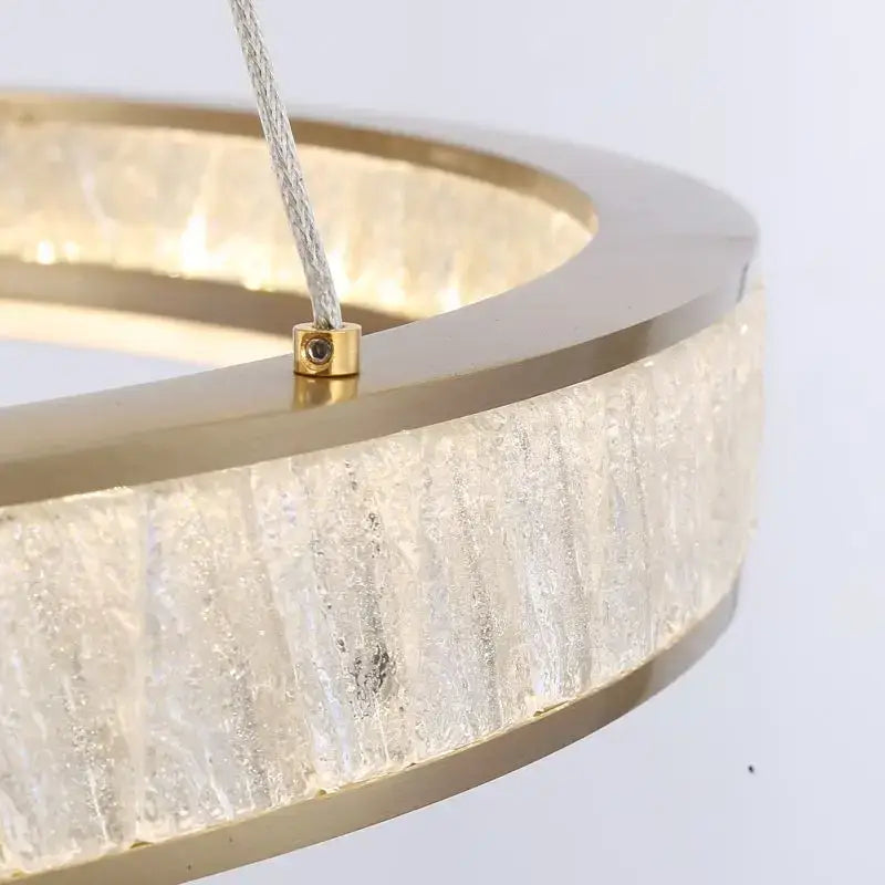 Gold-toned decorbites crystal oval pendant chandelier with textured translucent glass panels for dining room decor