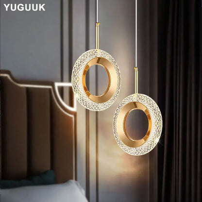 Gold crystal ring led pendant light with gold-toned circular frame and crystal-encrusted outer ring for dining room luxury chandelier