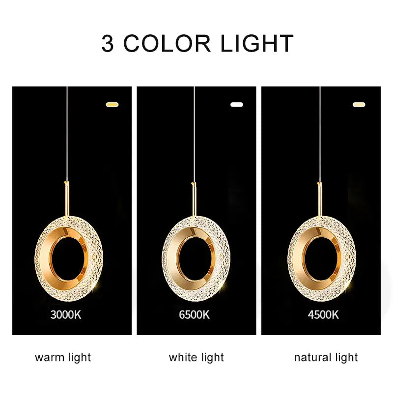 Gold-toned crystal ring led pendant light with textured design and three color lighting options for luxury dining room use