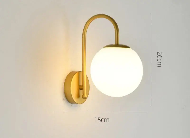 Gold curved arm glass ball led wall sconce with frosted glass globe shade for bedroom decorbites wall sconce