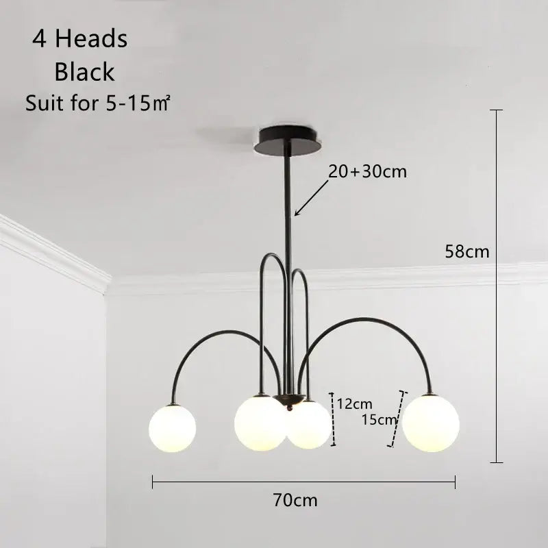 Black metal ball pendant chandelier with four frosted glass light fixtures for dining room decorbites glass ball