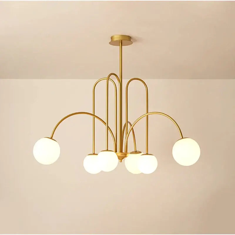 Gold curved arm glass ball pendant chandelier with six frosted glass globes for dining room decorbites glass ball lighting