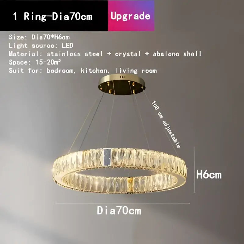 A modern ceiling chandelier with a gold decorbites crystal round design and stainless steel frame for dining rooms