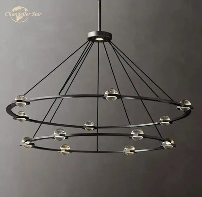 Modern black metal chandelier with two concentric rings and clear glass globes as a round crystal chandelier for dining room