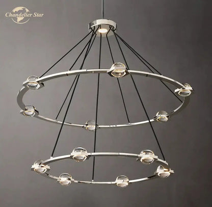 Modern two-tiered round crystal chandelier with polished chrome rings clear crystal spheres and black cords for dining room