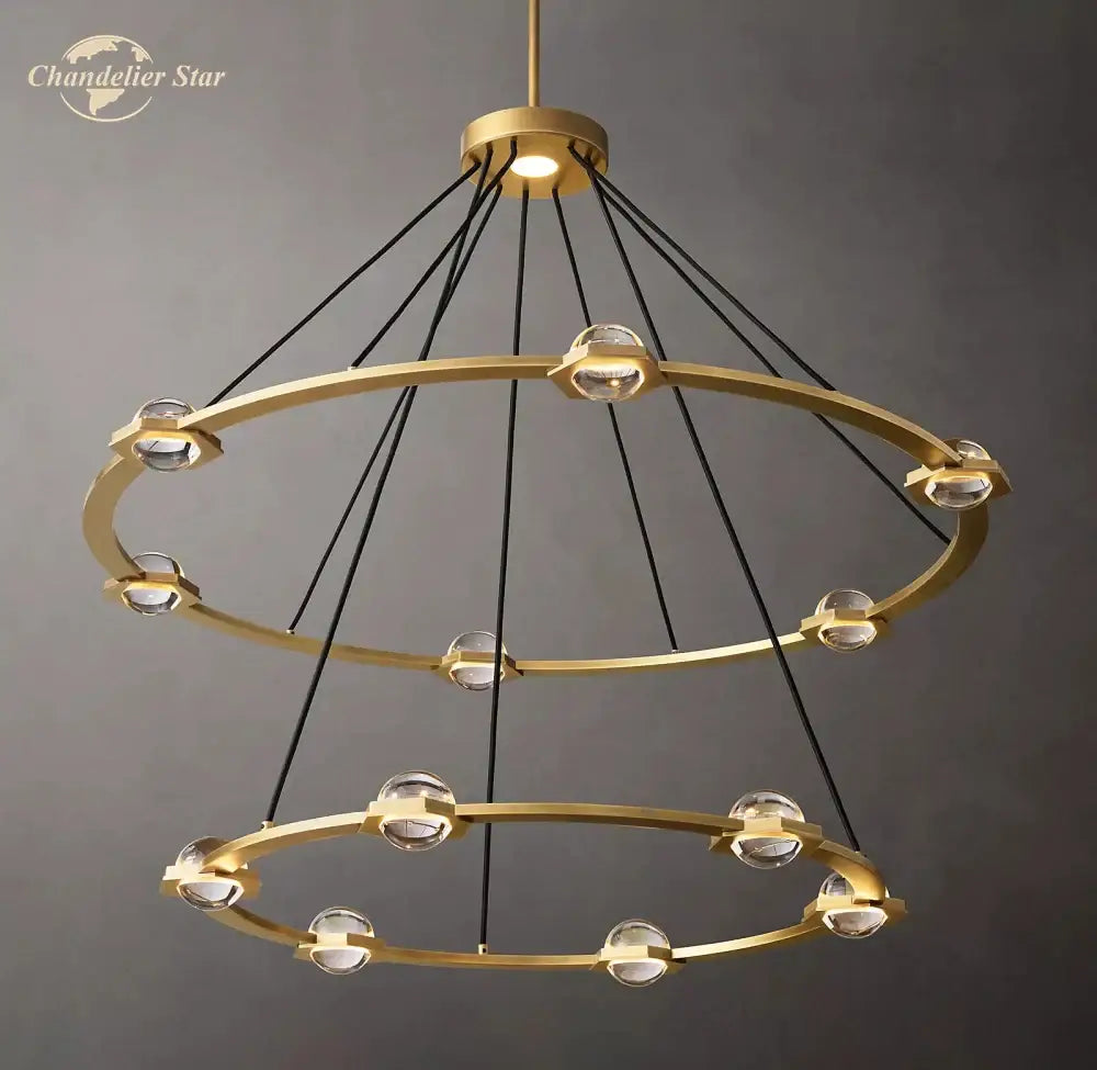 Gold-toned round crystal chandelier with double rings clear crystal spheres and black cords for dining room lighting