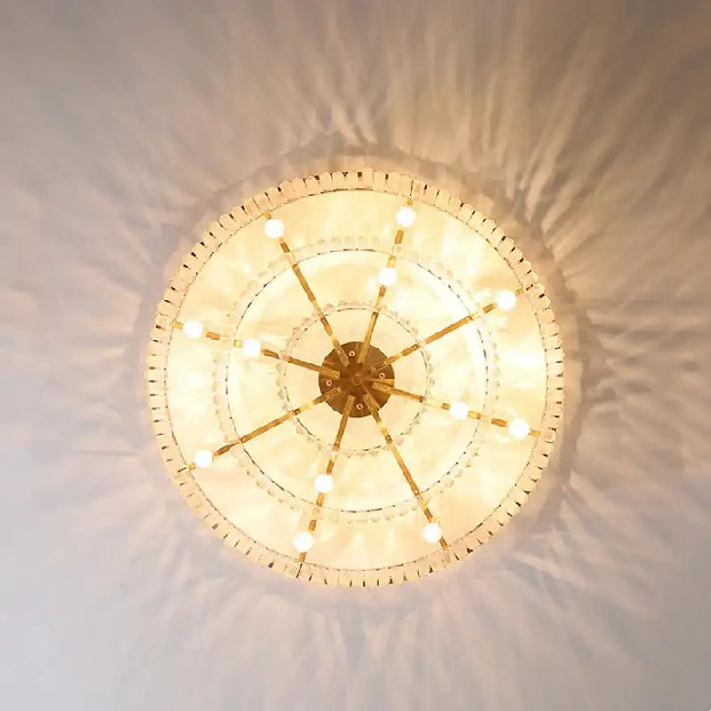 Gold dual purpose crystal ceiling lamp with brass finish and multi-tiered design for elegant bedroom decorbites dual purpose