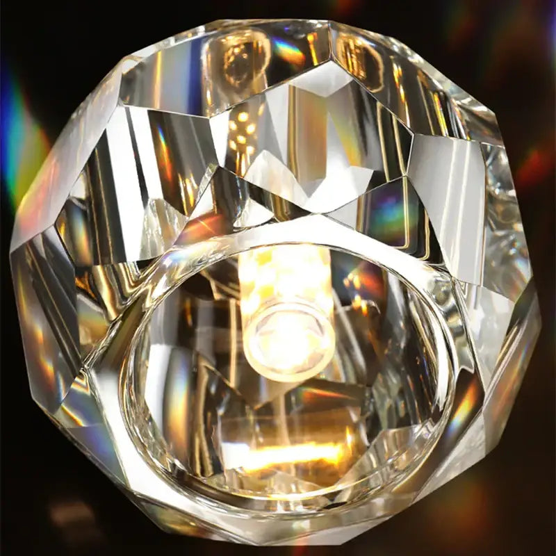 Faceted crystal globe ceiling light with warm glowing bulb in diamond crystal copper led pendant for dining room