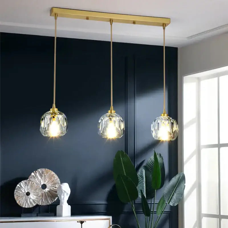 Gold-toned three-light copper led pendant with faceted diamond crystal glass shades for dining room lighting