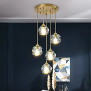 Gold five globe diamond crystal copper led pendant dining room light with gold-toned ceiling fixture and faceted crystal globes