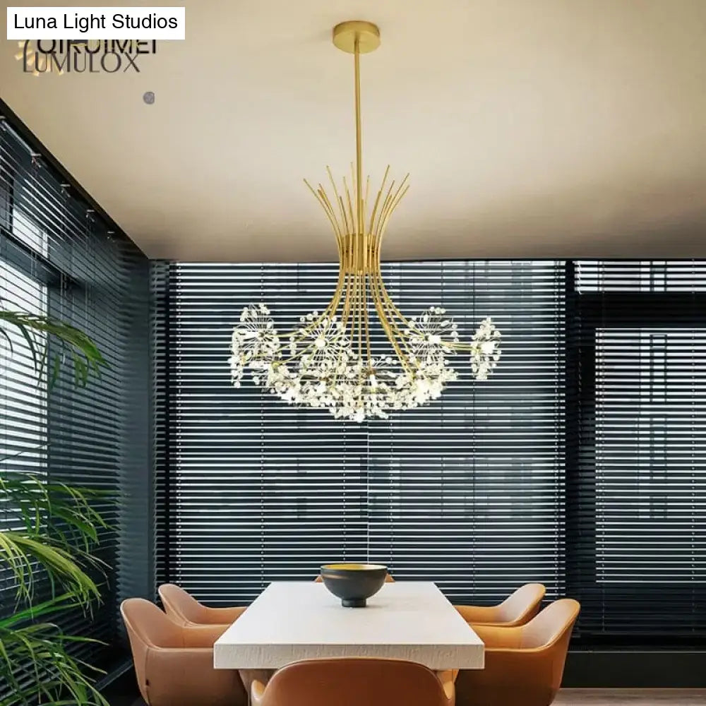 Gold-toned DecorBites™ Glory led flowers chandeliers with sculptural arms and clear crystals ideal for hotel lobby lighting