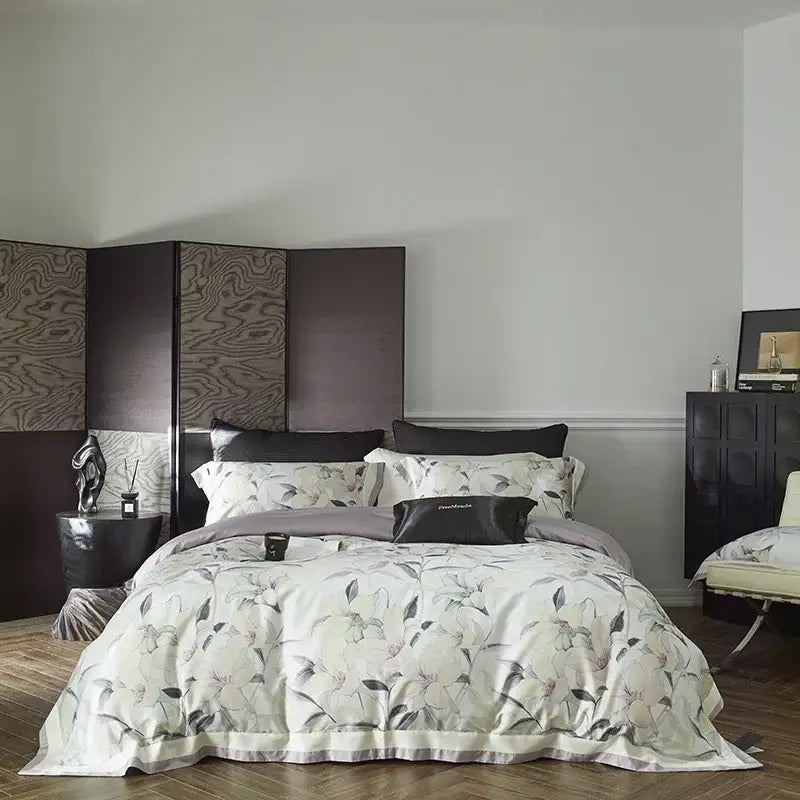 Elegant ivory satin cotton bedding set with delicate blush and gray floral pattern and subtle ruffled hem decorbites cotton bedding