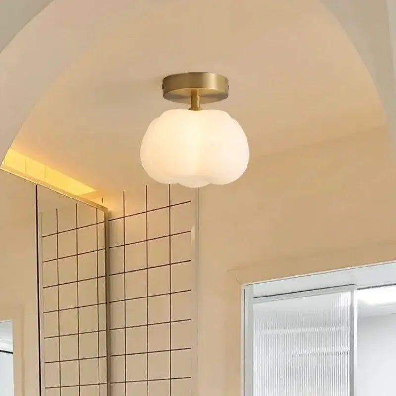Gold flower frosted glass ceiling lamp with a soft frosted glass globe and brass-finished mounting base for decorbites cotton shape led lighting