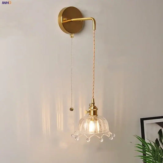 Gold-toned wall lights with decorbites clear glass led fluted shade and decorative crystal droplets for bedroom sconce decor
