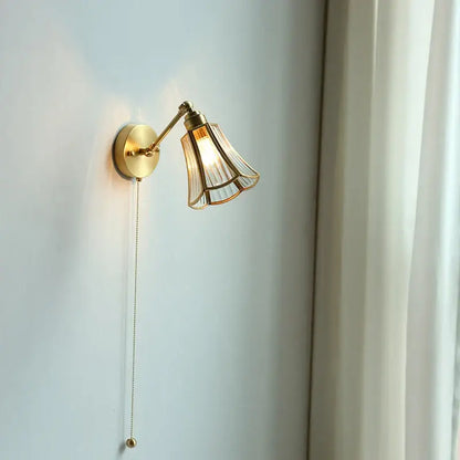 Brass-finished gold fluted glass wall sconce with adjustable arm ideal as decorbites copper wall lamp for bedroom